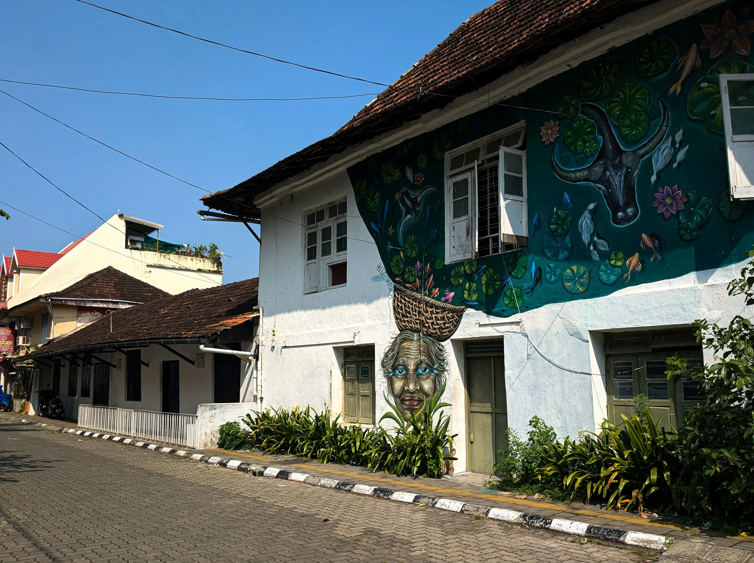 An old house on a street in Fort Kochi