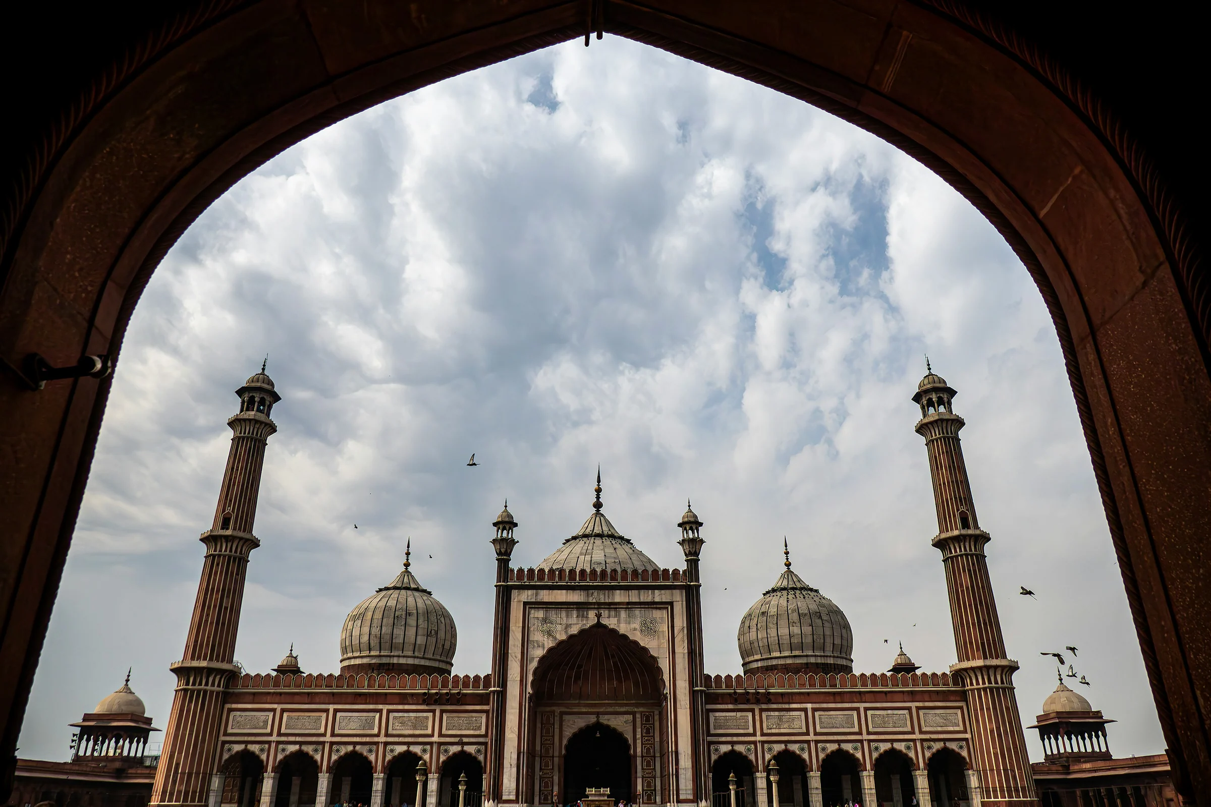 The Jama Masjid, Old Delhi, seen through an arch